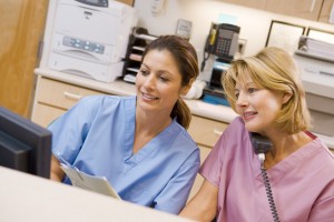 Medical office front desk staff learning about transgender inclusive policies